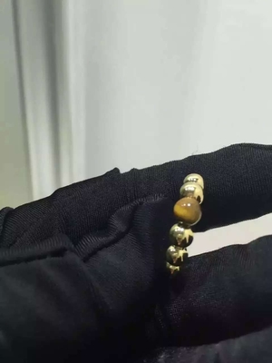Real Gold Ring Van Cleef & Arpels Perlée Variation Ring with Tiger's Eye Stone