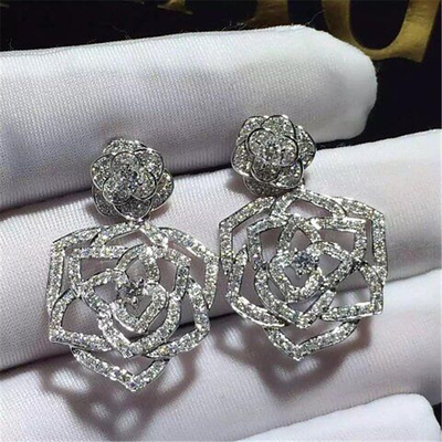 Piaget  full  diamonds of hollow  rose earring 18kt gold  with white gold or yellow gold