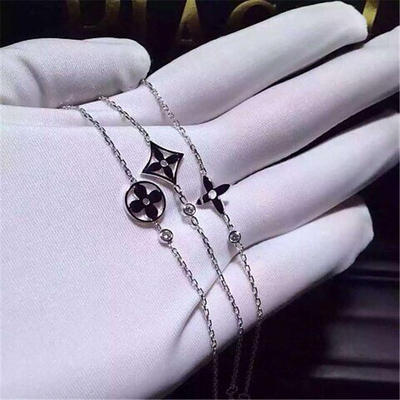   diamonds of logo bracelet 18kt  gold  with white gold