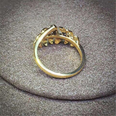  feather ring 18kt gold  with yellow gold