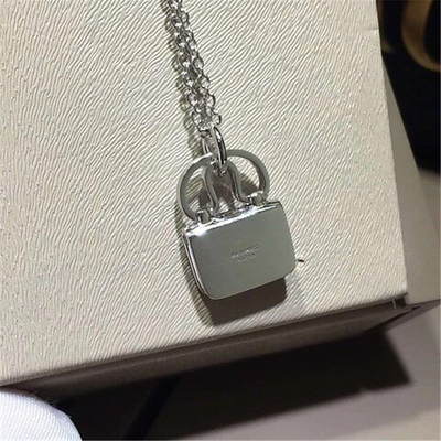  full diamonds of bag necklace 18kt gold  with white gold or yellow gold