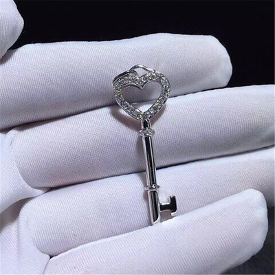   full diamonds of mini love key necklace 18kt gold  with yellow gold or white gold
