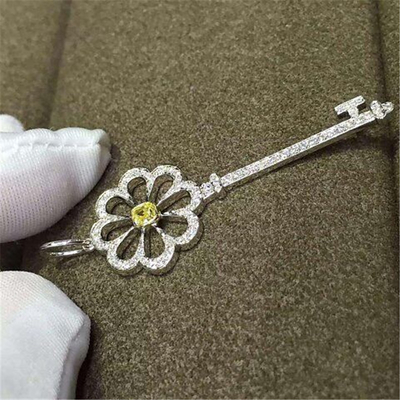   yellow diamonds  key of 18kt gold  with yellow gold or white gold or pink gold