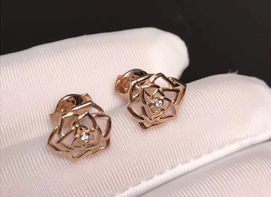 Piaget brand jewelry 18kt  Rose earrings in 18K rose gold set with 2 brilliant-cut diamonds (approx. 0.01 ct).