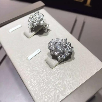 Piaget brand jewelry 18kt  Piaget Rose earrings in 18K white gold set with 72 brilliant-cut diamonds (approx. 0.45 ct).