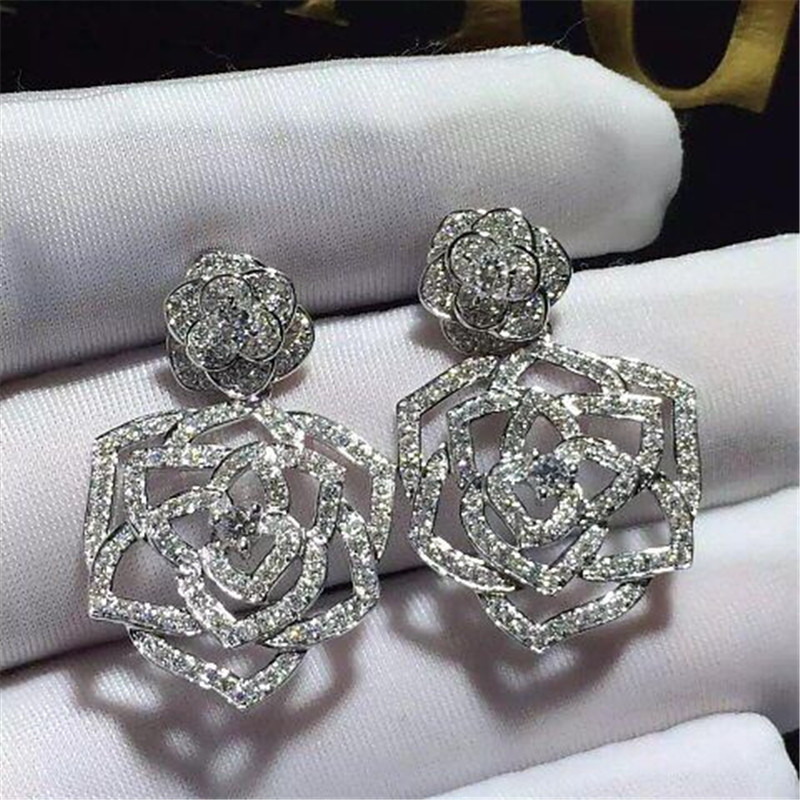 Piaget  full  diamonds of hollow  rose earring 18kt gold  with white gold or yellow gold