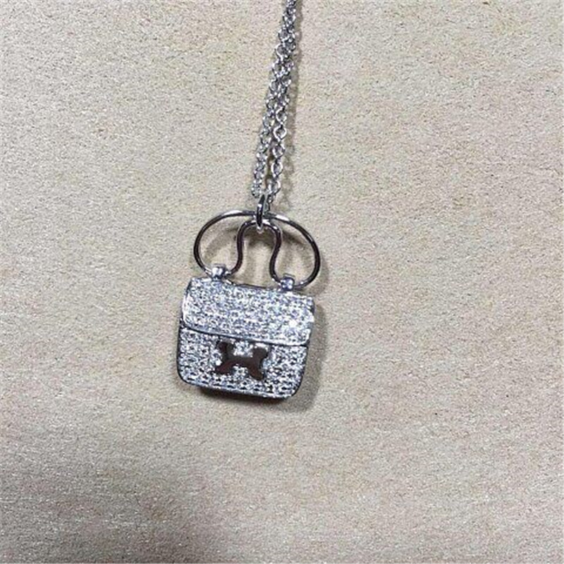  full diamonds of bag necklace 18kt gold  with white gold or yellow gold