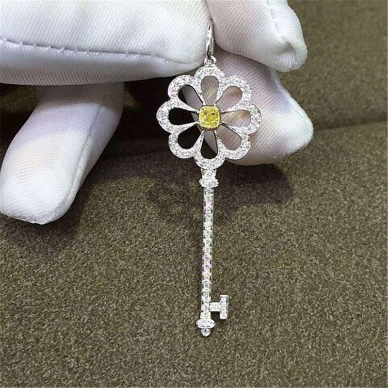   yellow diamonds  key of 18kt gold  with yellow gold or white gold or pink gold