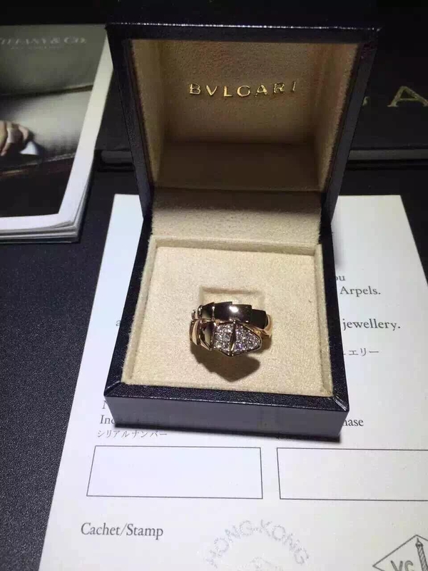  Serpenti one-coil ring in 18 kt rose gold, set with pavé diamonds on the head. brand jewelry